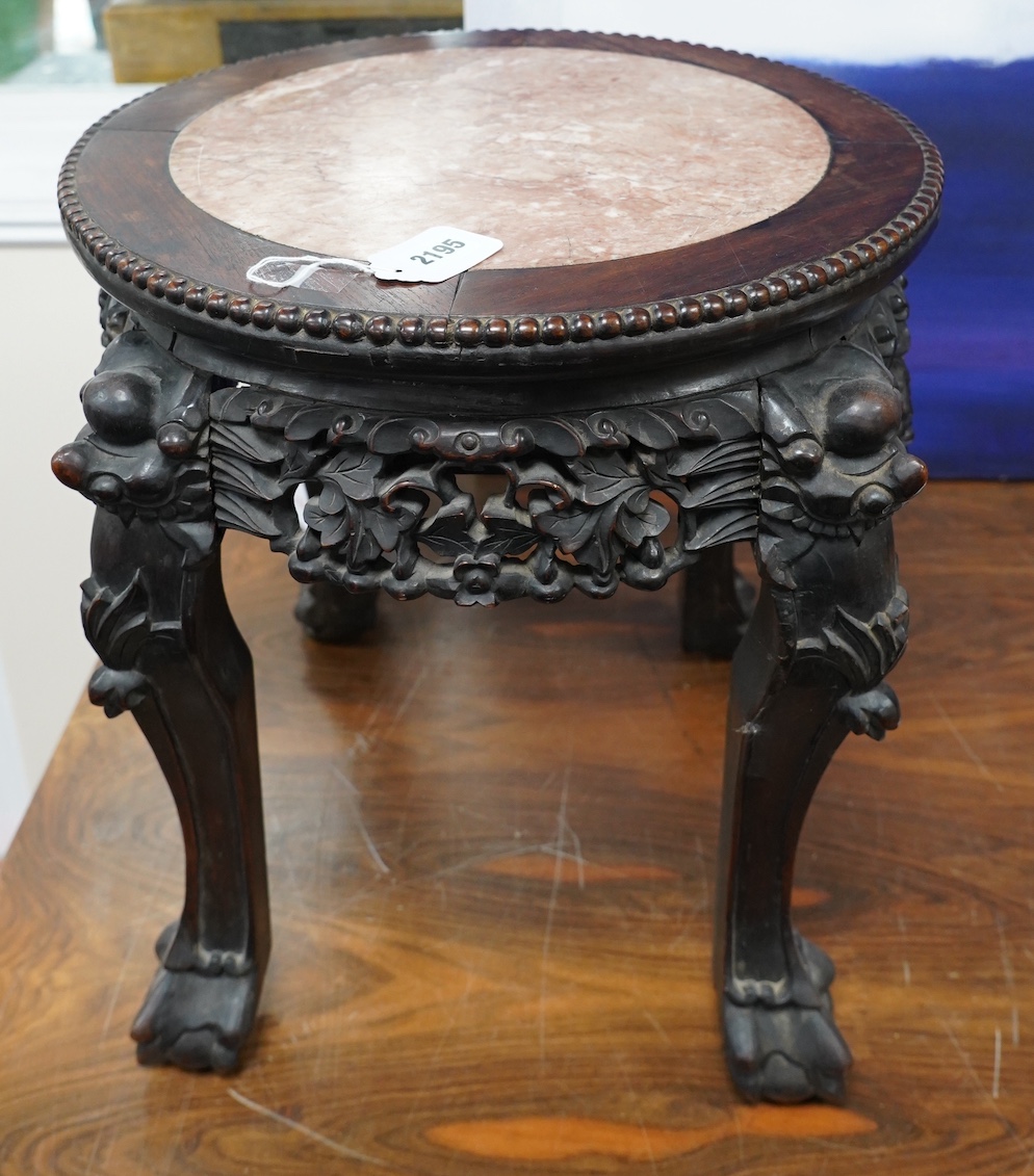 A Chinese hongmu stand, diameter 41cm, height 45cm. Condition - fair